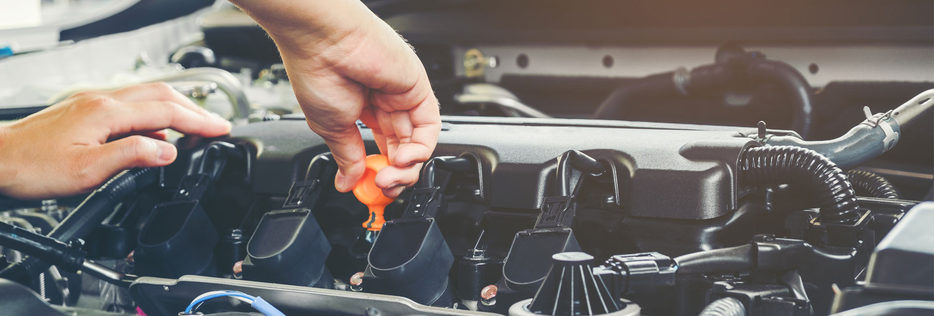 Mechanic Repairing Car